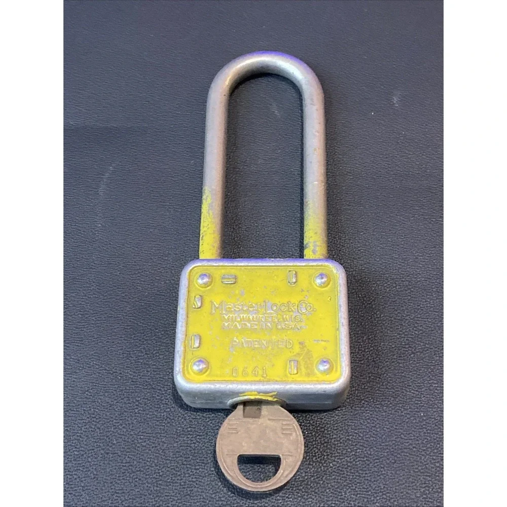 Vintage MASTER LOCK Padlock Lion Face Long Shackle 77 Works w/ Key Yellowish Clr